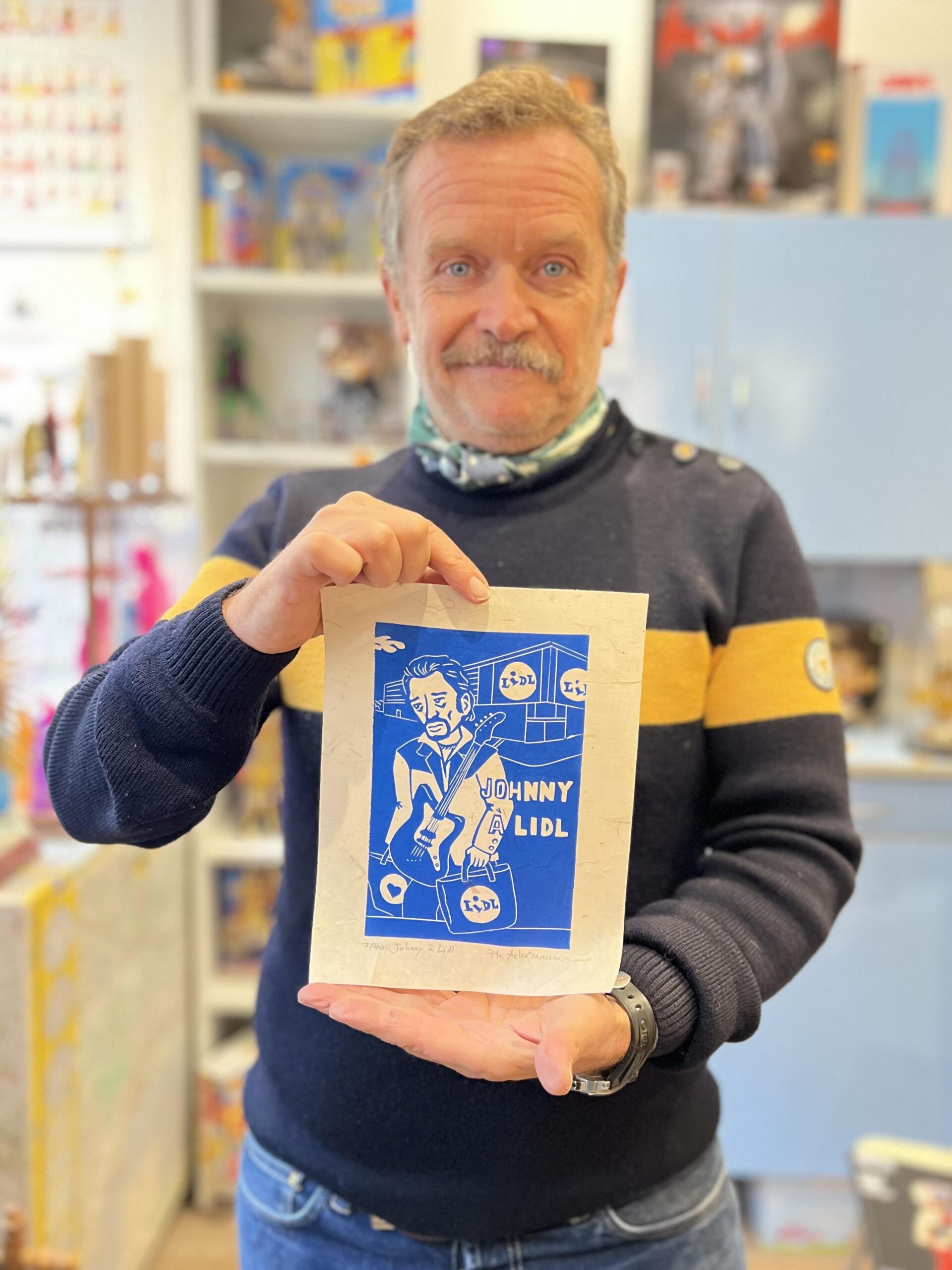 Mathieu de Dis Bonjour à la Dame présente une linogravure